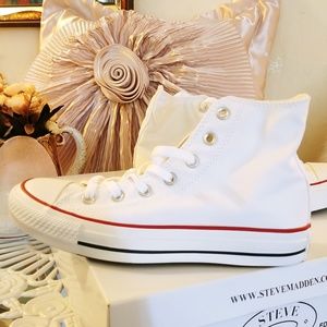 White converse shoes.